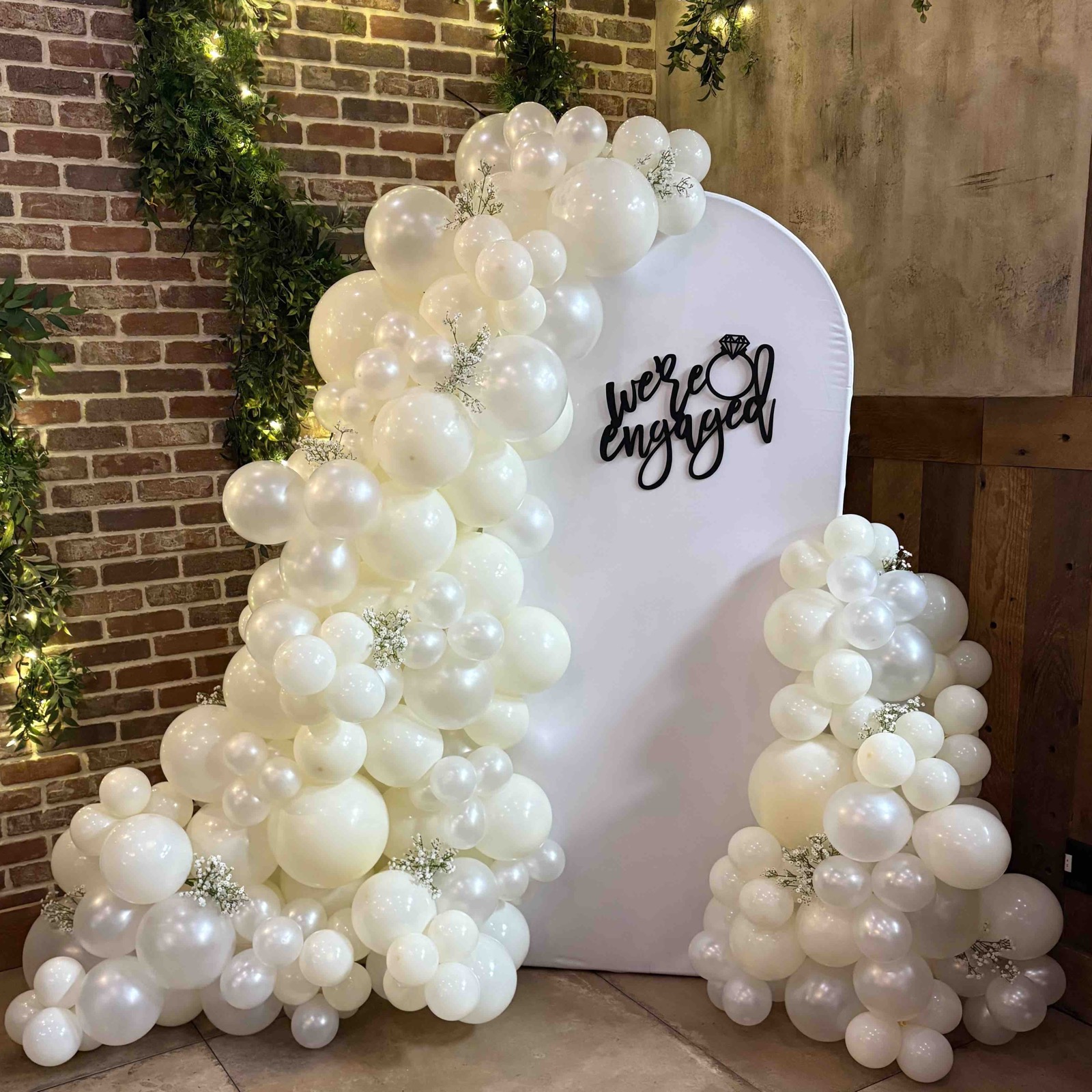 Organic white balloon arch installed by Arches & Aesthetics in Northern NJ